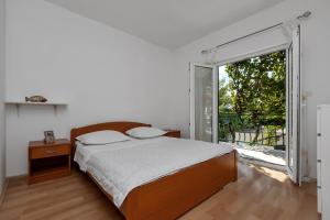 Apartments by the sea Drasnice, Makarska - 22698