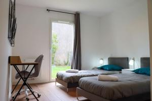 Appartements Les Cottages jardin elegant et ambiance cosy : photos des chambres