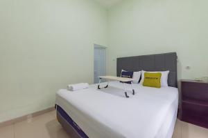Urbanview Hotel Nakasya Burangrang