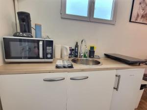 Appartements Road Stop Studio *Paris*Disney*Gare* : photos des chambres