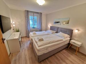 Dünenpark Binz - Komfortplus Ferienwohnung mit 1 Schlafzimmer und Balkon im Obergeschoss 290