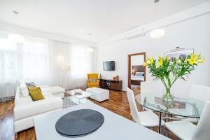 Elegant 2 - bedroom Apartment with Balcony and Parking