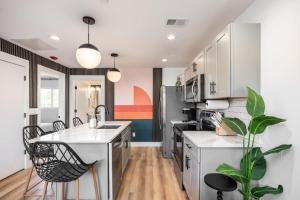 Colorful 2 Bedroom Retreat with 3 Beds Patio and Free Parking