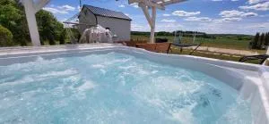 Domek z prywatnym duzym jacuzzi i sauna Przystan pod niebem - Leczyce
