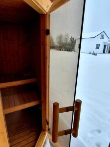 Domek z prywatnym duzym jacuzzi i sauna Przystan pod niebem