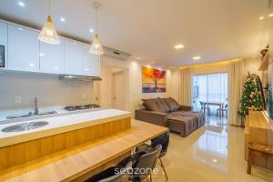 Apto c varanda e churrasq. 400m praia DBR0805