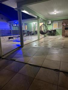 Aluguel casa com piscina no centro em TorresRS