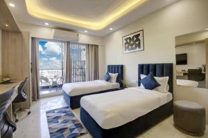 FlxHo Quad - Luxury Studio Apart Hotel DLF Cyber City