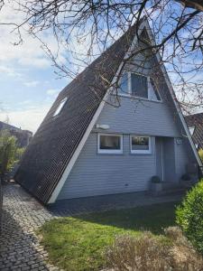 Nurdachhaus Zeltdachhaus Damp