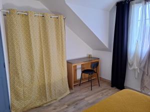 Maisons de vacances Cottage avec terrasse privative a 15 km d-Orleans : photos des chambres