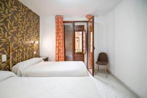 Double or Twin Room with Balcony room in Hotel Manzanito