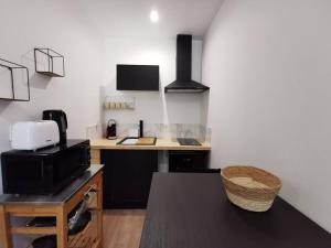 Appartements Charbon studio climatise parking terrasse : photos des chambres