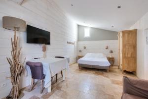Maisons de vacances Maison pour 10, acces direct a la plage : photos des chambres