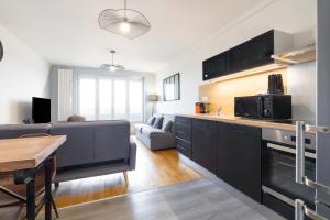 Appartements LE PANORAMA a deux pas du centre ville : photos des chambres