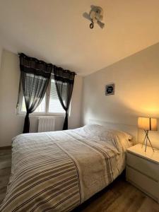Appartements Le coin cosy 38 m2 : photos des chambres