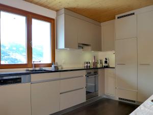 Apartment Chalet Gredetsch 6B by Interhome