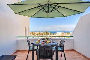 Heated Pool Costa Adeje in front of a beach