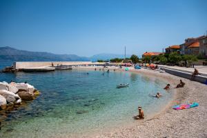 Apartments by the sea Postira, Brac - 22206