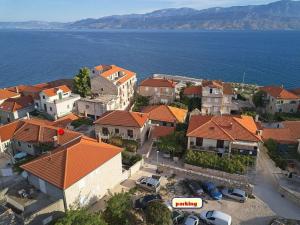Apartments by the sea Postira, Brac - 22206