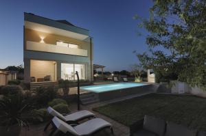 Holiday house with a swimming pool Barbariga, Fazana - 22763 