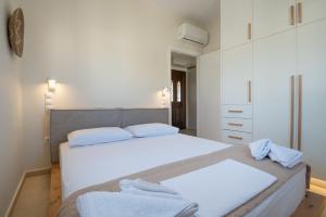 Stoupa Harmony Suites - Two Bedroom Apartment