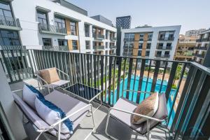 Lovely 2BR at Belgravia Square, JVC by Deluxe Holiday Homes