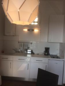 Appartements Au Soleil Couchant : photos des chambres