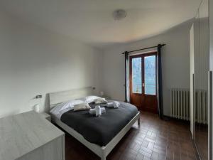 Appartamento Tivano, balcone con vista lago