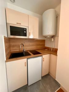 Appartements Studio 2 pers face gare SNCF Appart Hotel le Cygne D2 : photos des chambres