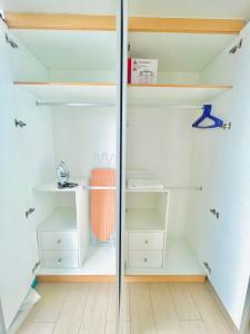 1 Queen Bed & 2 double beds at One Uptown Residences with XBOX and Netflix