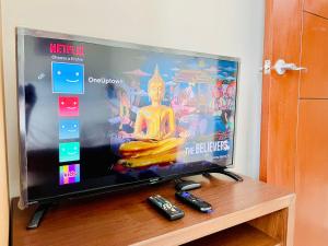 1 Queen Bed & 2 double beds at One Uptown Residences with XBOX and Netflix