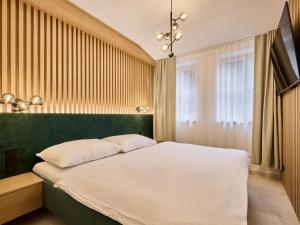 Apartment Rooftop Vista Maisonette & Relaxing Bath by Interhome