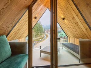 Apartment Rooftop Vista Maisonette & Relaxing Bath by Interhome