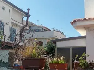 Mansarda con terrazzo vista mare - Falcone