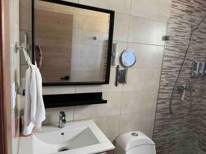Costal condo with gym and Olympic pool
