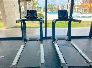 Costal condo with gym and Olympic pool