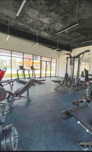 Costal condo with gym and Olympic pool