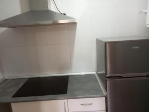 Apartamento con jardín y piscina junto a la playa
