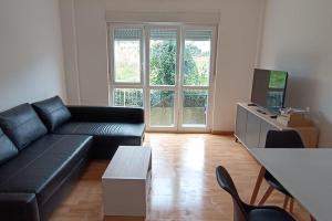 Apartamento con jardín y piscina junto a la playa