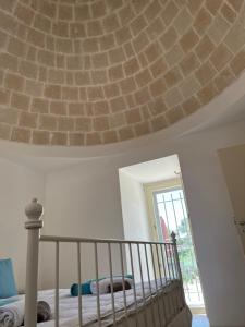 Borgo Paoli Trullo Lui in Ostuni, exclusive pool & olive grove
