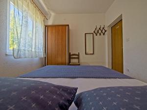 Apartments by the sea Postira, Brac - 22200