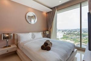 R I V I E R A l Luxury Apartments l Guest Friendly l Jomtien beach