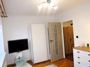 Large holiday apartment with a garden in Stepnica