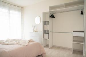 Appartements L’Elegant - T2 - 10 min aeroport - Parking prive : photos des chambres