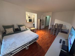 Appartements F3 avec balcon 5 min gare SQY et Parking gratuit : photos des chambres
