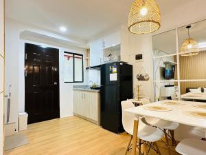 Ravens Nest Cozy Condo with Netflix Wi-fi in Imus