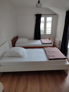 Maisons de vacances Location petite maison : photos des chambres