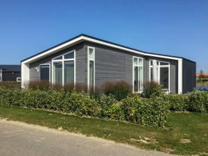 Chalet in Zeeland with Sauna by the Water