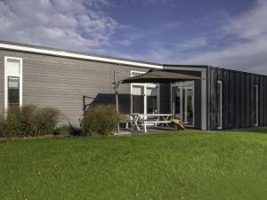 Chalet in Zeeland with Sauna by the Water