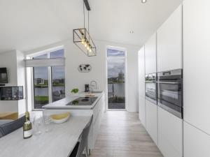 Chalet in Zeeland with Sauna by the Water